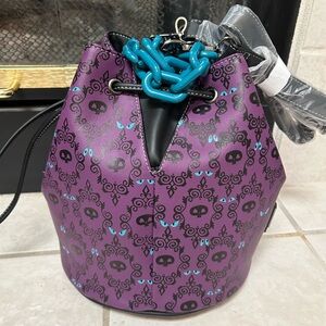 Disney Haunted Mansion lounge fly glowing eyes NWT